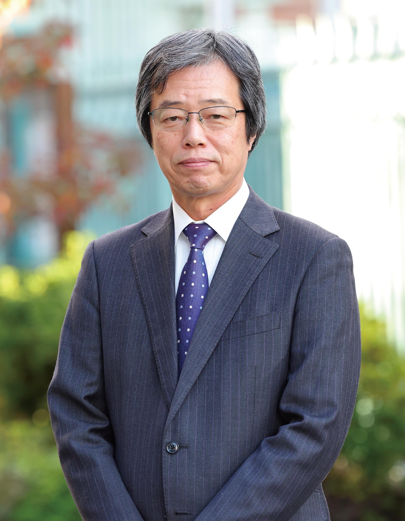 英真学園高等学校 理事長 坪田 浩行